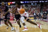 No. 24 Wisconsin takes surge into L.A. to face USC