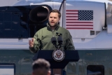 JD Vance shoots a big boy gun before heading off to bully Greenland