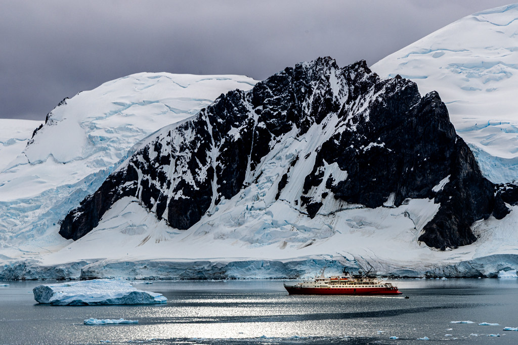 Dog leg fjord | Beneath the heavy Antarctic sky, the expedit…