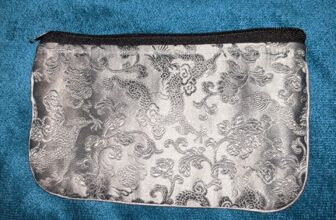 Gray embroidered zipper pouch