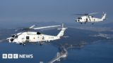 Desperate search for crew in Japan helicopters crash