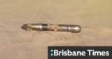 Navy torpedo washes up on Gold Coast beach, sparking lockdown